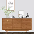 Wooden Entryway Console Table With Drawers Green Plant Photo Frame And Music Sheet Poster