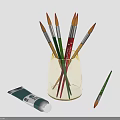 Colorful Paintbrushes In Transparent Cup With Paint Tube For Daily Art Supplies