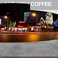 Modern Bubble Tea Shop Interior With Cozy Seating Marble Counter Wall Art And Green Plants