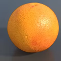 Fresh Ripe Grapefruit With Bright Orange Smooth Textured Skin On Gray Background