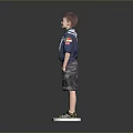 Boy Scout Standing on White Platform With Blue Shirt Neckerchief and Shorts