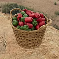 Vibrant Fresh Red and Green Bell Peppers in Wicker Basket for Healthy Meals
