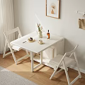 Minimalist White Dining Table And Chairs Set With Decorative Items In Bright Living Room
