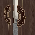 Elegant Traditional Brass Door Handle With Carved Patterns On Wooden Door