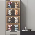 Colorful Bear Sculptures In Various Metallic Hues On Multi Tiered Display Shelf