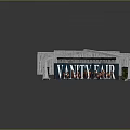 Vanity Fair Stage Setup With Group Of Performers In Orange Outfits On White Platform