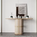 Stylish Console Table With Woven Base Wooden Top And Decorative Items Near Wall Art