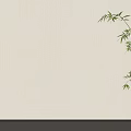 Beige Textured Wall with Green Bamboo Branch and Fresh Leaves