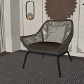 Modern Wicker Leisure Chair With Light Cushion Woven Wall Decor And Green Plant