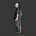 Elderly Man In Dark Green Shirt Standing With Woman In Floral Dress Against Gray Background
