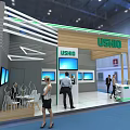 USHIO Exhibition Booth With Modern Design Multiple Blue Screens And People Interacting