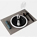 Tableware Set with Black and White Plate Chopsticks Napkin and Wine Glasses on Placemat