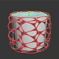 Black Intricate Cutout Candle Holder With White Candle And Modern Design
