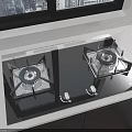 Sleek Black Glass Gas Stove On White Kitchen Countertop Near Window Background