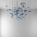 Modern Blue Decorative Pendant Lights with Multiple Disc Shapes Hanging in Contemporary Interior Design