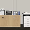 Light Wood Bookcase Holding Printers Scanners Folders And Documents Beside White Drawer Cabinet