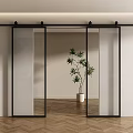 Modern Sliding Barn Door With Glass Panels And Black Frame In Interior