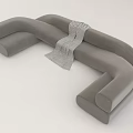 Curved Shape Modern Gray Fabric Sofa With Striped Throw Blanket Design 3d model