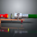 Mechanical Device Model On Wooden Stand With Red Green Cylinders And Metal Components