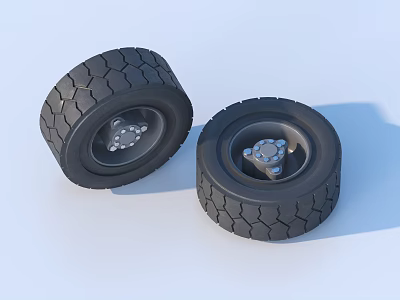 Two Heavy Duty Tires With Deep Tread Pattern And Metallic Rims 3d model
