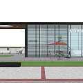 Modern Starbucks Coffee Shop Exterior With Glass Facade Outdoor Seating And Green Lawn