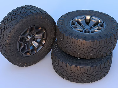 Three Off Road Tires With Black Metallic Rims And Aggressive Tread Design 3d model