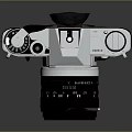 Vintage Canon Electronic Camera With Silver Black Body And Colorful Bird Reflection On Lens