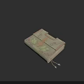Light Green Decorative Book With Intricate Leaf Patterns And Tassel Accent