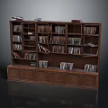 Dark Colored Wooden Bookshelf With Multiple Shelves Filled With Books And Bottom Storage