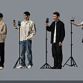 Group of People Using Microphones and Holding Phones for Live Streaming Session