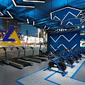 Modern Fitness Studio Interior With Blue Lighting Stationary Bikes And Wall Posters