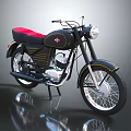 Vintage Black Motorcycle With Red Seat Gold Accents Round Headlight And White Rims