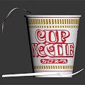Cup Noodles With Open Lid Showing Noodles Inside And White Fork Beside