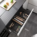 Modern Kitchen Interior With Organized Cookware Open Drawers Knives Dishes And Cabinets