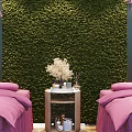 Spa Sauna Room Featuring Massage Beds Pink Sheets Purple Curtains Green Vertical Garden And Chandeliers