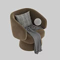 Light Gray Upholstered Lounge Chair With Curved Armrests Plaid Blanket And Throw Pillow