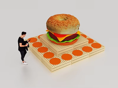 Floral Installation Art Featuring Giant Burger Model On Wooden Base With Orange Accents And Person Viewing 3d model
