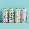 Tuborg Refreshing Beverage Cans With Colorful Striped Design On Light Blue Background