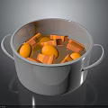 Fresh Orange Chunks Simmering In White Pot For Delicious Homemade Stew