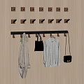 Wooden Wall With Multiple Hooks Holding Coats Shirt And Bags