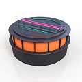 Circular Component With Black Outer Shell Colored Stripes And Orange Base