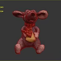 Plush Mouse Character Sitting With Red Scarf And Holding Yellow Cheese On Black Surface