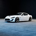 White Maserati Sports Car With Sleek Exterior Design And Alloy Wheels
