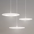 Three Modern White Disc Shaped Pendant Lights With Minimalist Hanging Design