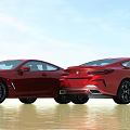 Two Red Sports Cars Parked Side By Side With Sleek Design And Shiny Reflections