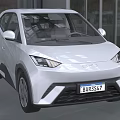 White Compact Car with Modern Sleek Front Design LED Headlights in Indoor Showroom Setting