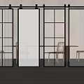 Modern Sliding Doors With Black Frame And Glass Panels Partitioning Interior Space With Wooden Chairs