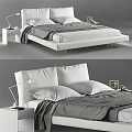 Modern Double Bed with White Headboard Gray Blanket Nightstand Table Lamp and Pillows
