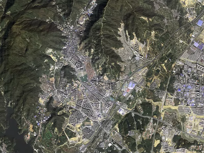 Satellite View of City Surrounded by Green Mountains and River With Residential Industrial Zones 3d model