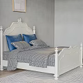 White Double Bed With Carved Headboard Gray Checkered Bedspread And Blue Pillows